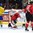 HELSINKI, FINLAND - DECEMBER 26: Team Sweden gets the puck past Switzerland's Joren Van Pottelberghe #30 for their eighth goal of the game during preliminary round action at the 2016 IIHF World Junior Championship. (Photo by Matt Zambonin/HHOF-IIHF Images)

